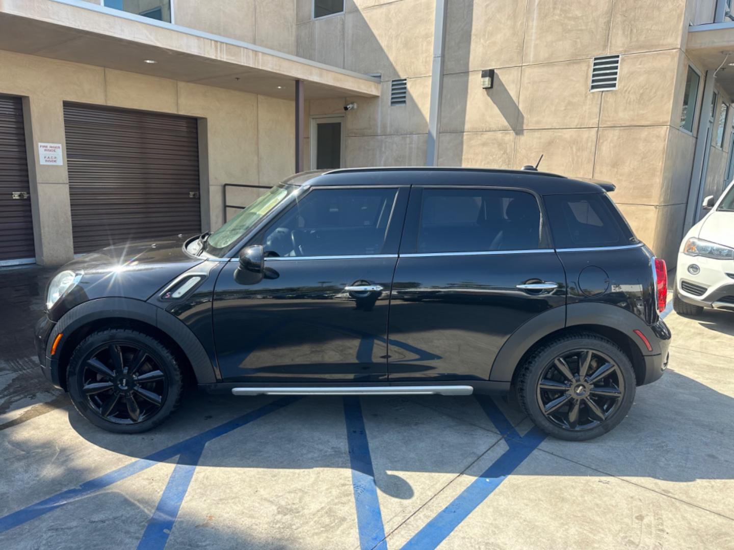 2015 Black /Black Mini Countryman S (WMWZC3C54FW) with an 1.6L L4 DOHC 16V TURBO engine, Automatic transmission, located at 30 S. Berkeley Avenue, Pasadena, CA, 91107, (626) 248-7567, 34.145447, -118.109398 - Photo#2